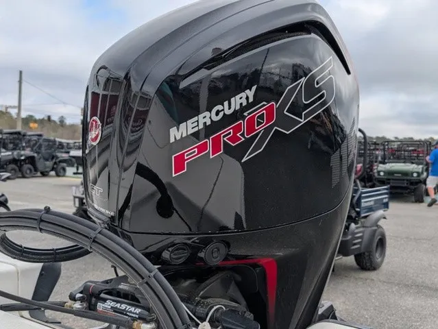 Slide: The Image of A Mercury Pro XS outboard motor is mounted on a Mako 18 Pro Skiff. - 24