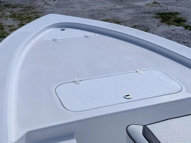 Slide: The Image of The image shows the deck of a 2025 ALK2 Powerboats 17 HS with storage hatches. - 23