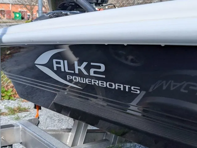 Slide: The Image of Close-up of the 2025 ALK2 Powerboats 17 HS on a trailer. - 10