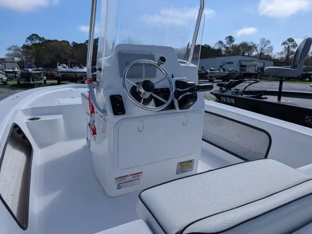 Slide: The Image of The image shows the cockpit of a 2025 ALK2 Powerboats 17 HS with a helm station. - 18