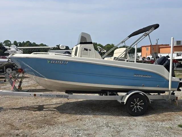 Slide: The Image of A blue 2023 Stingray 173 CC sits on a trailer in an outdoor lot. - 3