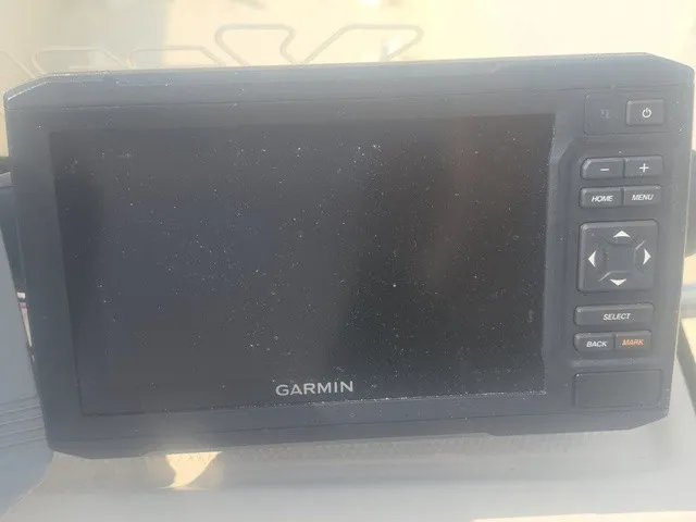 Slide: The Image of A Garmin navigation device with buttons on the right side is visible. - 19
