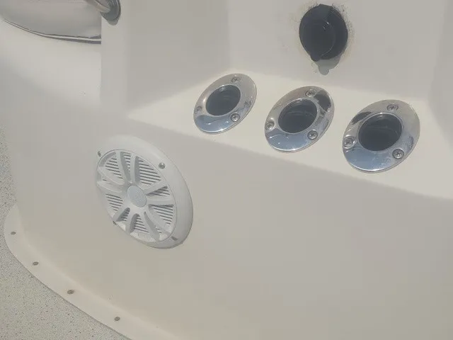 Slide: The Image of Close-up of fishing rod holders and a speaker on a boat. - 16