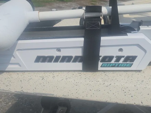 Slide: The Image of Close-up of a Minn Kota Riptide trolling motor on a boat. - 31