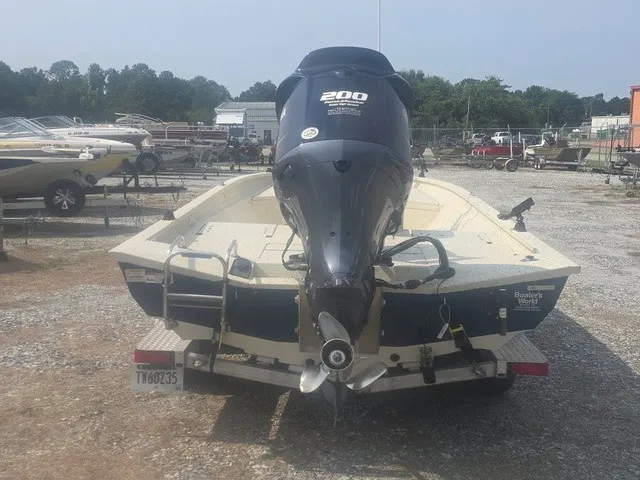 Slide: The Image of Rear view of a 2012 Xpress H22B Bay boat with a 200 HP outboard motor. - 8