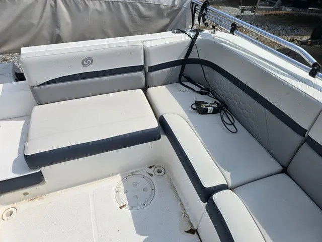 Slide: The Image of The image shows the seating area of a 2021 Hurricane SunDeck Sport 192 RL OB boat. - 19