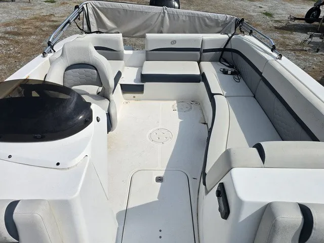 Slide: The Image of The image shows the spacious cockpit of a 2021 Hurricane SunDeck Sport 192 RL OB with gray upholstery. - 17