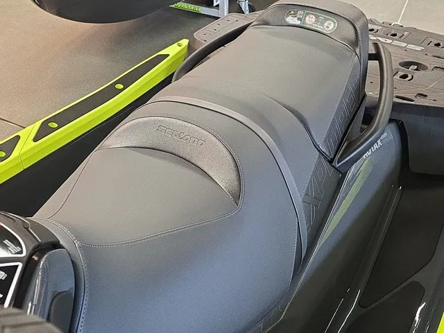Slide: The Image of Close-up of a Sea-Doo Explorer Pro 2026 with a gray seat and dashboard. - 18