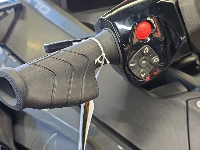 Slide: The Image of Close-up of a Sea-Doo GTX 170 jet ski handlebar with control buttons. - 13
