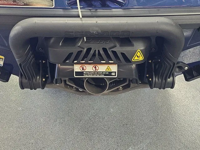 Slide: The Image of Close-up of a Sea-Doo GTX 170 jet ski exhaust system with warning labels. - 21