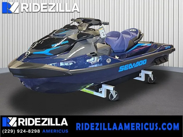 The Image of A 2026 Sea-Doo GTX 170 jet ski is displayed on a stand in a showroom. - 1