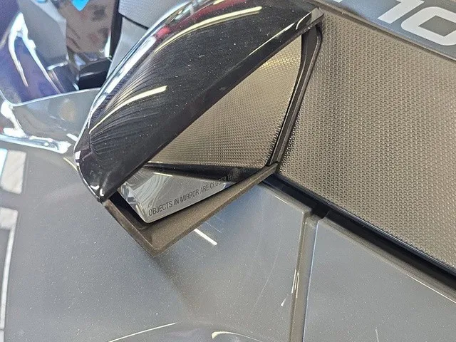 Slide: The Image of Close-up of a side mirror on a 2026 Sea-Doo GTX 170. - 10