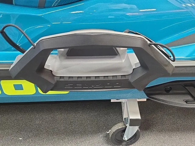 Slide: The Image of Close-up of a 2026 Sea-Doo Wake Pro 230 featuring a sturdy handle and a wheeled stand. - 19