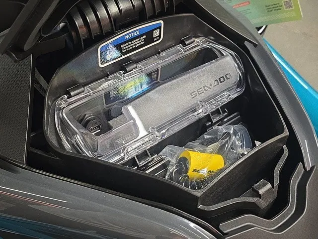 Slide: The Image of Close-up of a Sea-Doo Wake Pro 230 storage compartment with accessories. - 15
