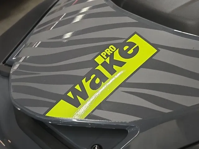 Slide: The Image of Close-up of the Sea-Doo Wake Pro 230 with bold yellow and black design. - 11