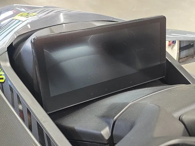 Slide: The Image of Close-up of a 2026 Sea-Doo Wake Pro 230 featuring a modern display. - 14