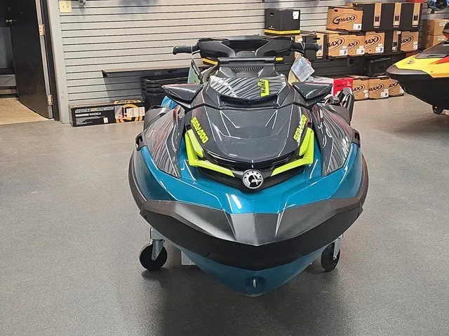 Slide: The Image of 2026 Sea-Doo Wake Pro 230 in a showroom setting. - 3