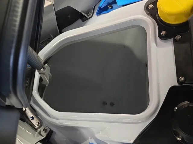 Slide: The Image of Close-up of a 2026 Kawasaki Jet Ski STX, showing part of the interior with technical details. - 21