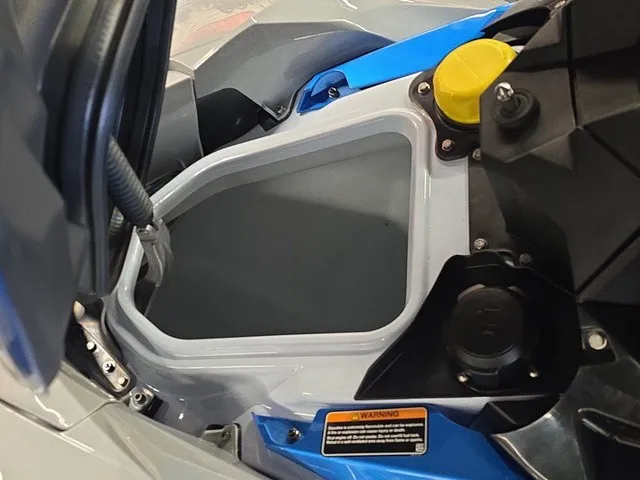 Slide: The Image of Close-up of a 2026 Kawasaki Jet Ski STX. Visible are the storage compartment and technical details. - 20