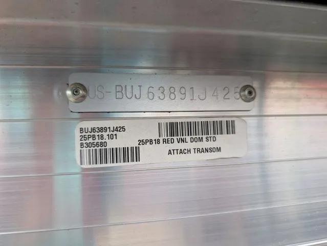 Slide: The Image of Close-up of a boat hull with serial number and model information on a label. - 31