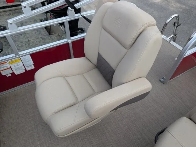 Slide: The Image of A beige captain's chair on a Sun Tracker Party Barge 18 DLX pontoon boat. - 13