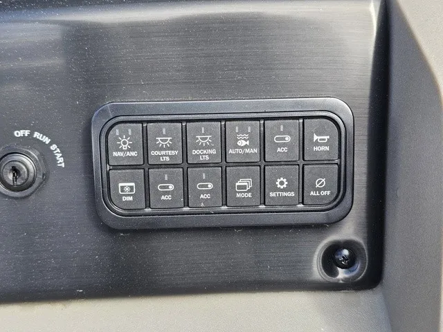 Slide: The Image of Control panel with various buttons for boat functions, including lighting and horn. - 22