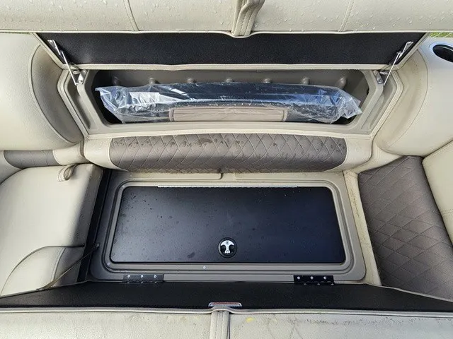 Slide: The Image of Bench seat with storage and cushioning on a 2025 Sun Tracker Fishin' Barge 20 DLX. - 29