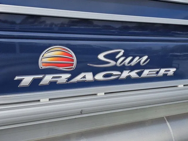 Slide: The Image of Close-up of the Sun Tracker logo on a blue background. - 6