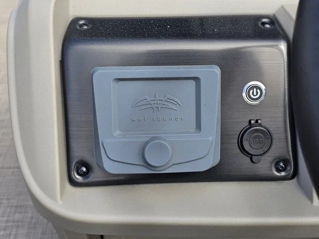 Slide: The Image of Close-up of a control panel featuring a Wet Sounds speaker and USB port. - 25