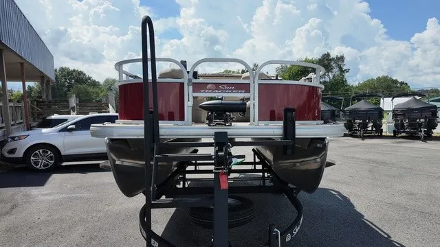 Slide: The Image of A 2025 Sun Tracker Bass Buggy 16 XL Select on a trailer. The sky is cloudy. - 7