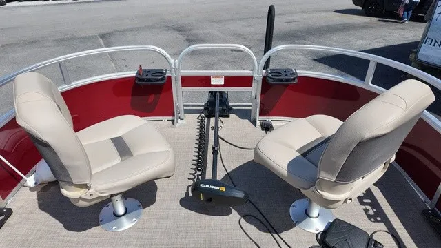 Slide: The Image of The image shows the deck of a 2025 Sun Tracker Bass Buggy 16 XL Select with two swivel seats. - 12