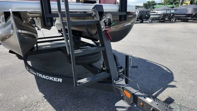 Slide: The Image of A 2025 Sun Tracker Bass Buggy 16 XL Select on a trailer, ready for transport. - 9