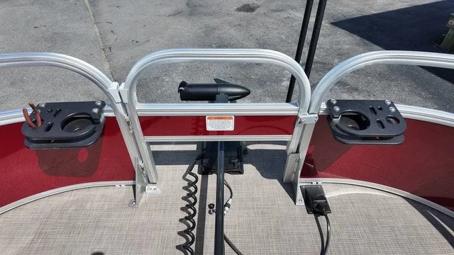 Slide: The Image of The image shows the deck of a 2025 Sun Tracker Bass Buggy 16 XL Select with fishing rod holders. - 11