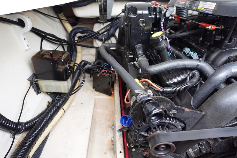 Slide: The Image of Engine compartment of a 2005 Formula 280 Sun Sport boat, showing detailed components and wiring. - 66