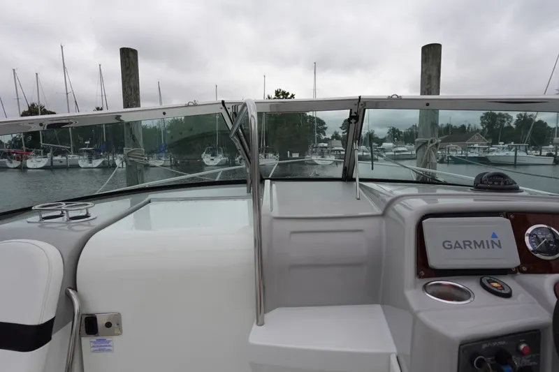 Slide: The Image of Cockpit view of Formula 280 Sun Sport boat with Garmin navigation system at marina. - 20