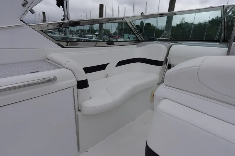 Slide: The Image of Interior of Formula 280 Sun Sport boat with white seating and sleek design. - 26