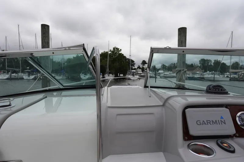 Slide: The Image of Cockpit view of Formula 280 Sun Sport boat with Garmin navigation system. - 21