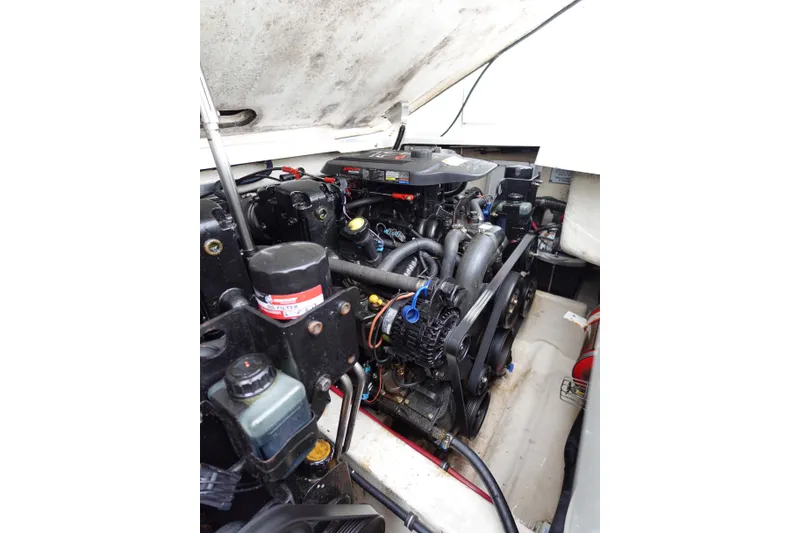 Slide: The Image of Engine compartment of a 2005 Formula 280 Sun Sport boat, showcasing mechanical components. - 71