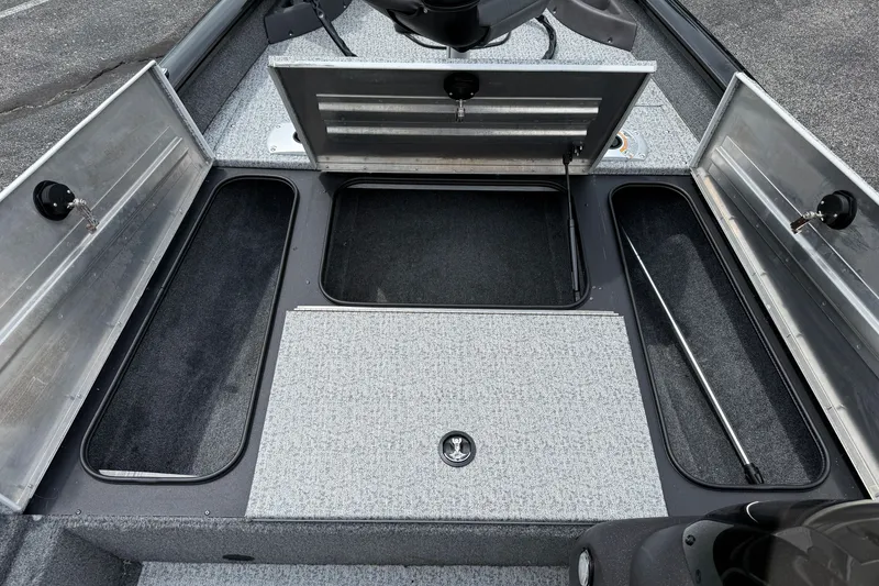 Slide: The Image of 2024 Tracker Pro Team 175 TF boat storage compartments, open and spacious for gear organization. - 14