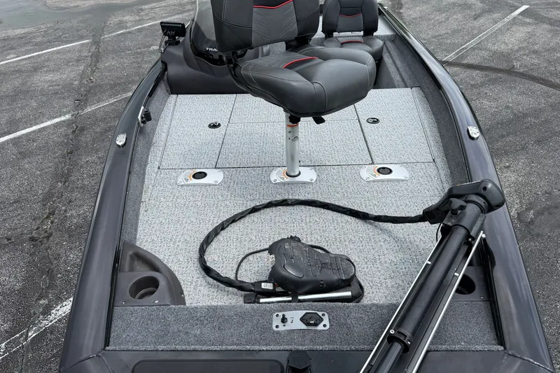 Slide: The Image of 2024 Tracker Pro Team 175 TF boat interior with seating and fishing deck. - 29