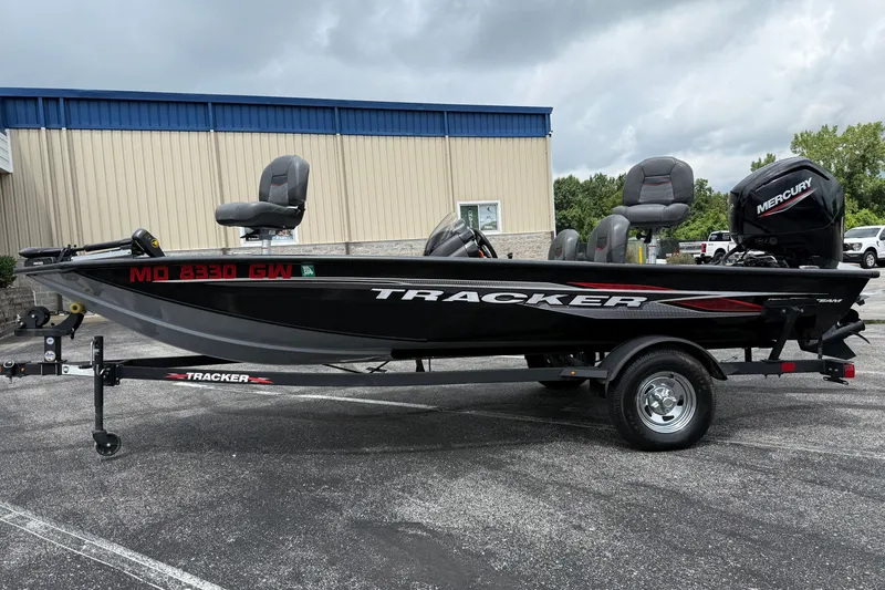 The Image of 2024 Tracker Pro Team 175 TF fishing boat with Mercury engine on trailer. - 1