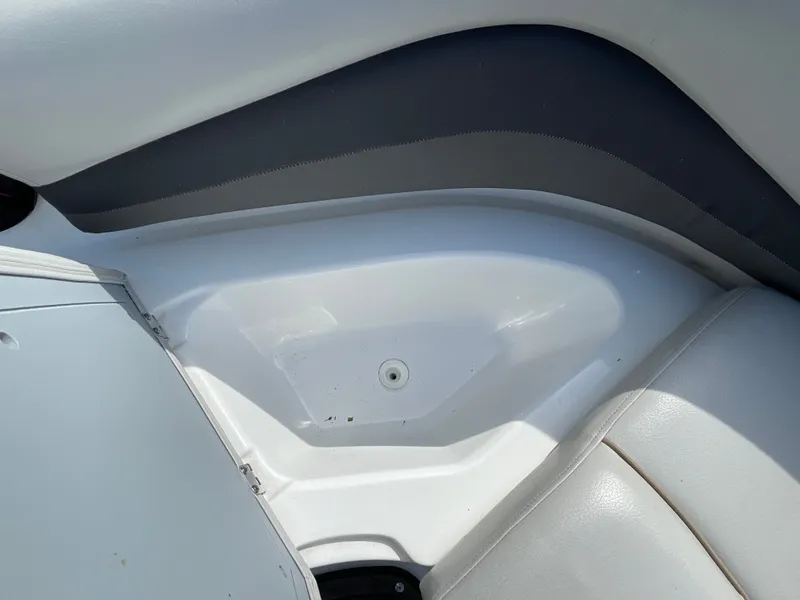 Slide: The Image of Close-up of a white boat seat with gray accents. - 29