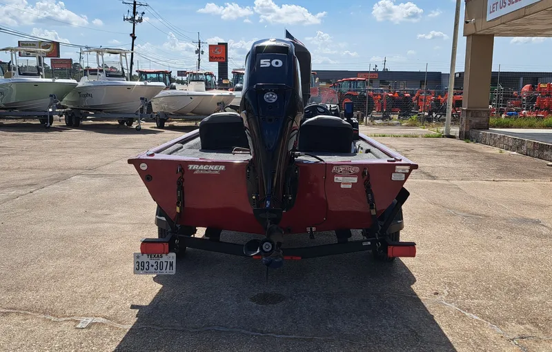 Slide: The Image of Rear view of a 2022 Tracker Pro 170 boat with a 50 HP motor on a trailer. - 11