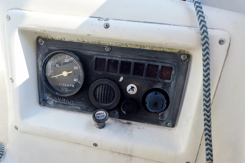 Slide: The Image of Control panel of a 1988 Tartan 34-2 sailboat with Yanmar tachometer. - 17
