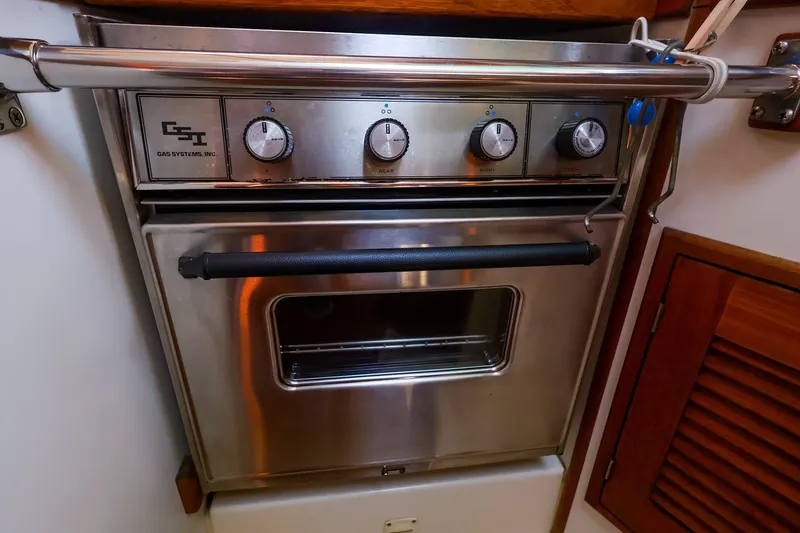 Slide: The Image of Stainless steel oven in 1988 Tartan 34-2 yacht kitchen, featuring GSI Gas Systems controls. - 35