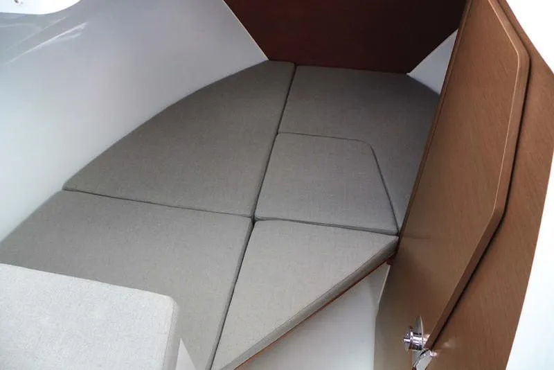 Slide: The Image of Manufacturer Provided Image: 2019 Jeanneau NC 695 cabin interior with cushioned seating. - 8