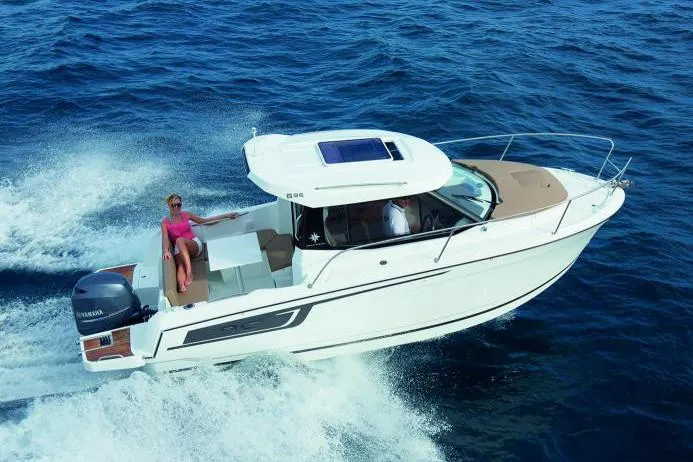 The Image of Manufacturer Provided Image: 2019 Jeanneau NC 695 motorboat cruising on open water. - 0