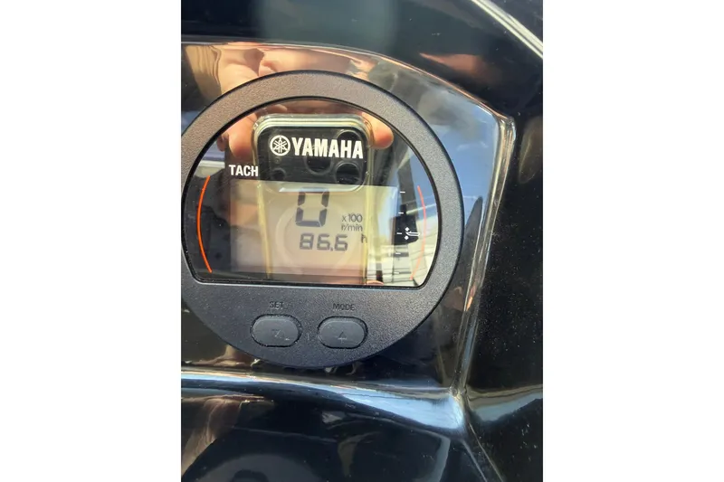 Slide: The Image of Yamaha tachometer display on 2019 Jeanneau NC 695 boat dashboard. - 23
