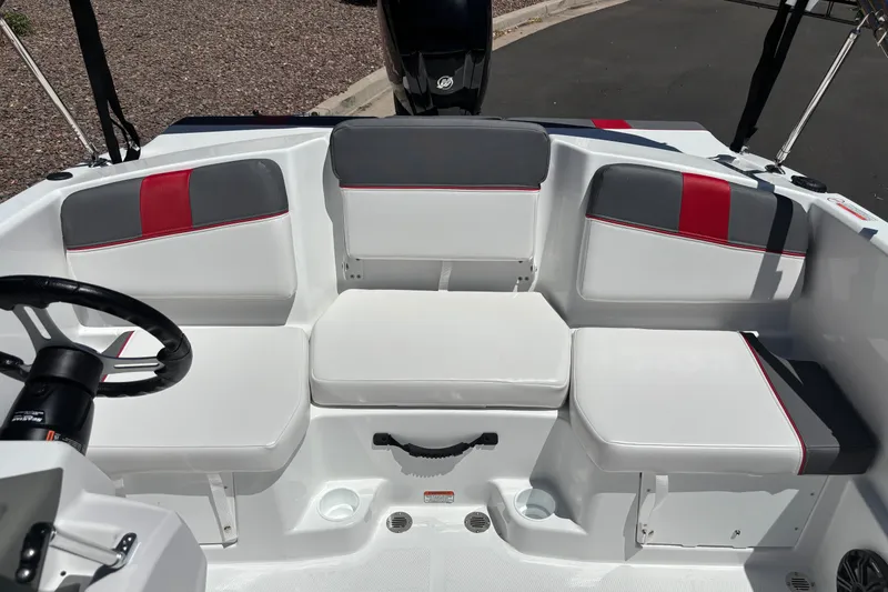 Slide: The Image of Interior seating of 2027 Tahoe T16 boat with white and red upholstery. - 17