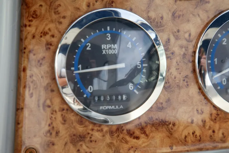 Slide: The Image of Close-up of a boat tachometer, displaying 316 hours of operation. - 37